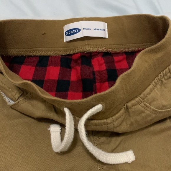 Old Navy pants lined with plaid black and red fabric. - Picture 4 of 6
